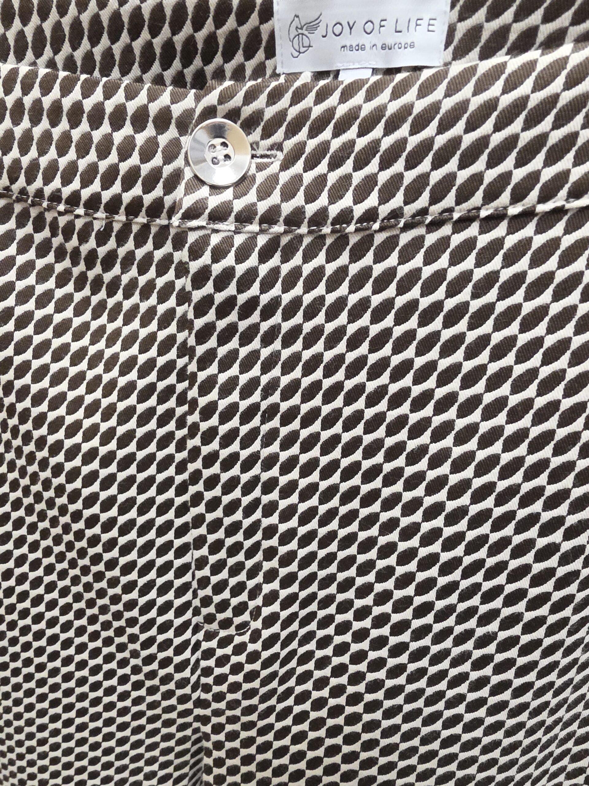damskie spodnie plus size z geometrycznym wzorem